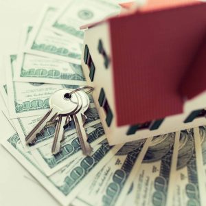 tiny house with red roof money keys
